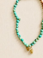 le collier charm turquesa