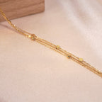 le bracelet triple doré
