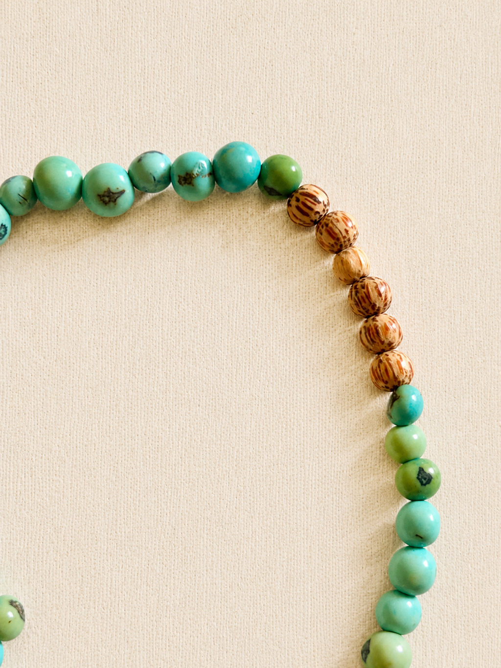 le collier charm turquesa