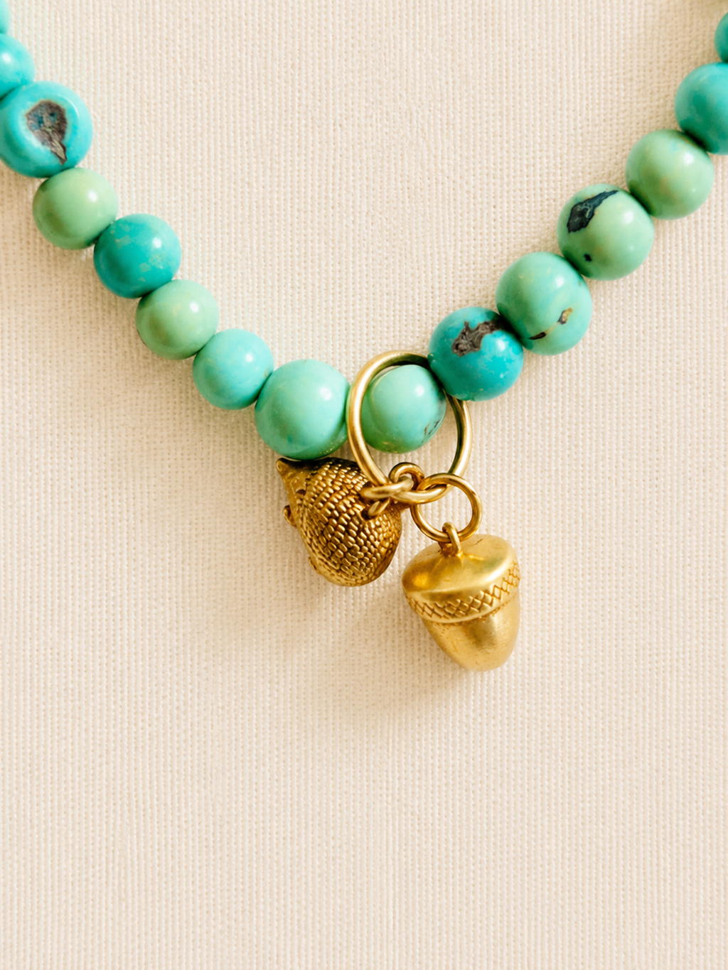 le collier charm turquesa