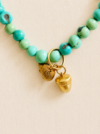 le collier charm turquesa