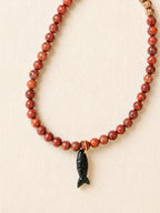le collier poisson noir