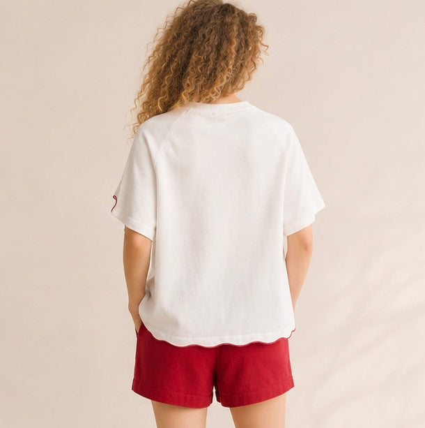 le sweat marine rouge